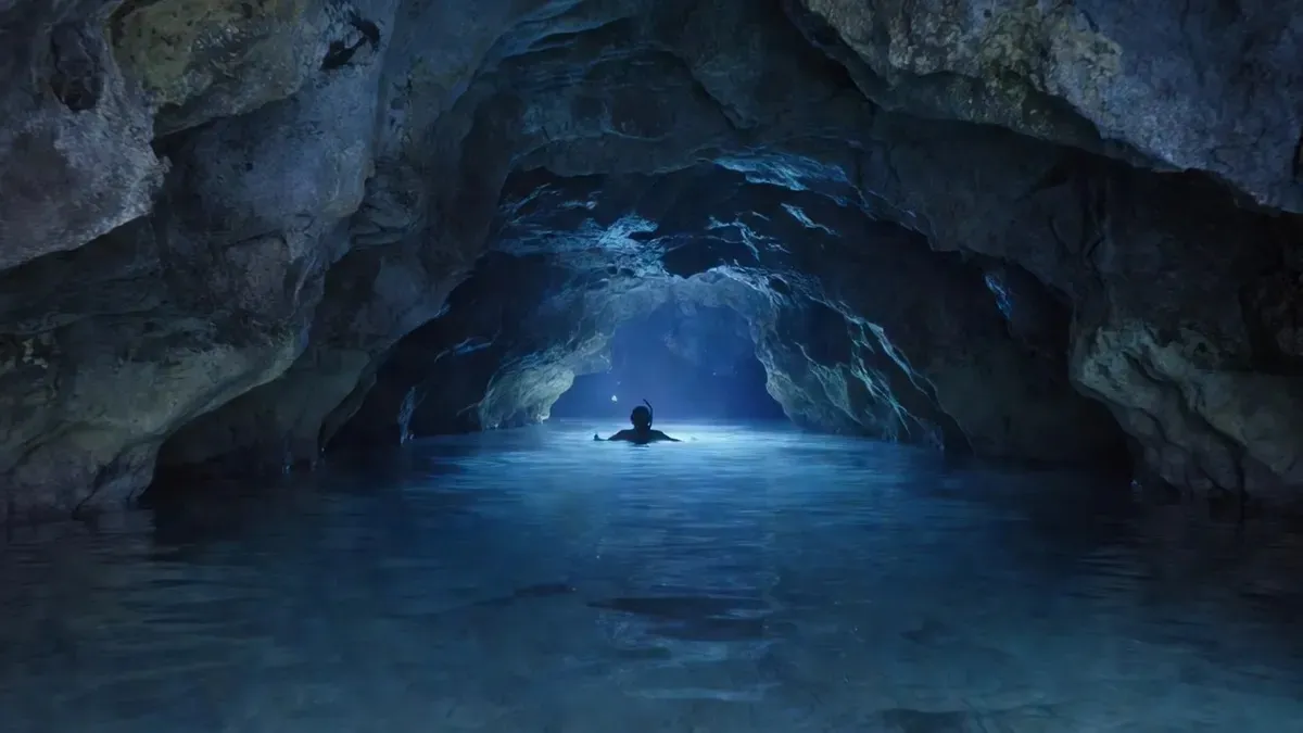 Blue light glowing inside the limestone Blue Cave on an ishigaki snorkeling tour in Okinawa, Japan
